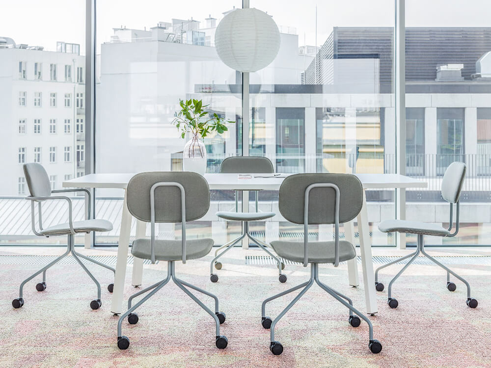 Solera – Barrel Shaped Meeting Table With White Legs..